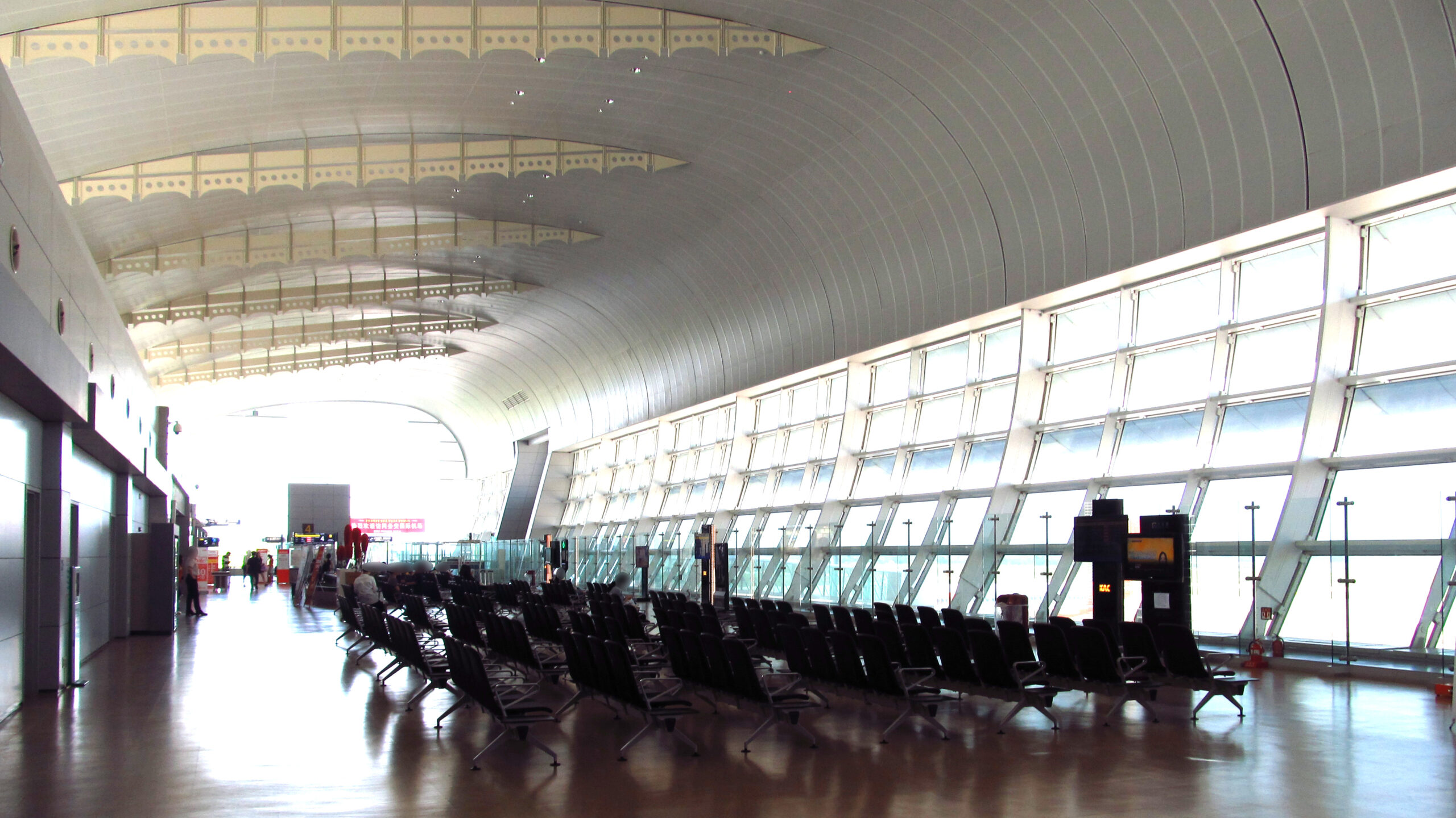 Boarding area at Muan International Airport in May 2019, with rows of seats and large windows.